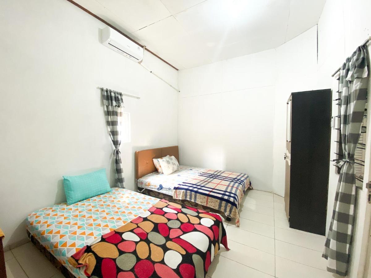 Homey Guesthouse Kertajaya  Surabaya Bagian luar foto